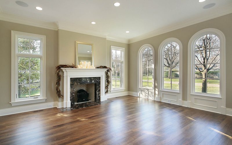 Living room in new construction home with marble fireplace